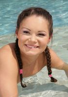 ATK Archives: Georgina (Horny and fit babe Georgina gets naked outdoors in the pool)